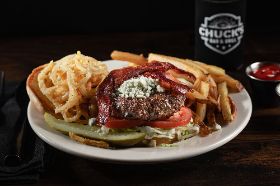 a hearty and flavorful burger that brings the bold taste of Texas straight to your plate. Featuring crumbled blue cheese, crispy bacon, and a stack of tumbleweed onions, this burger is big on flavor and sure to satisfy even the heartiest appetite.