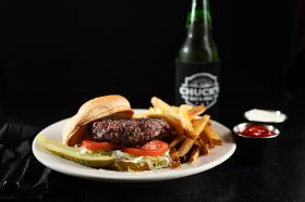 A simple thing of beauty – The Perfect burger for the "hamburger purist",i.e. no "junk" to get in the way of that fresh beef flavor, charbroiled to perfection.